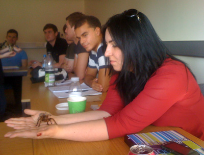 Tarantula on student's hand
