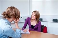Photo of a student conducting an interview