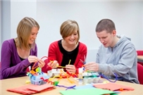 Photo of a students doing a language development task