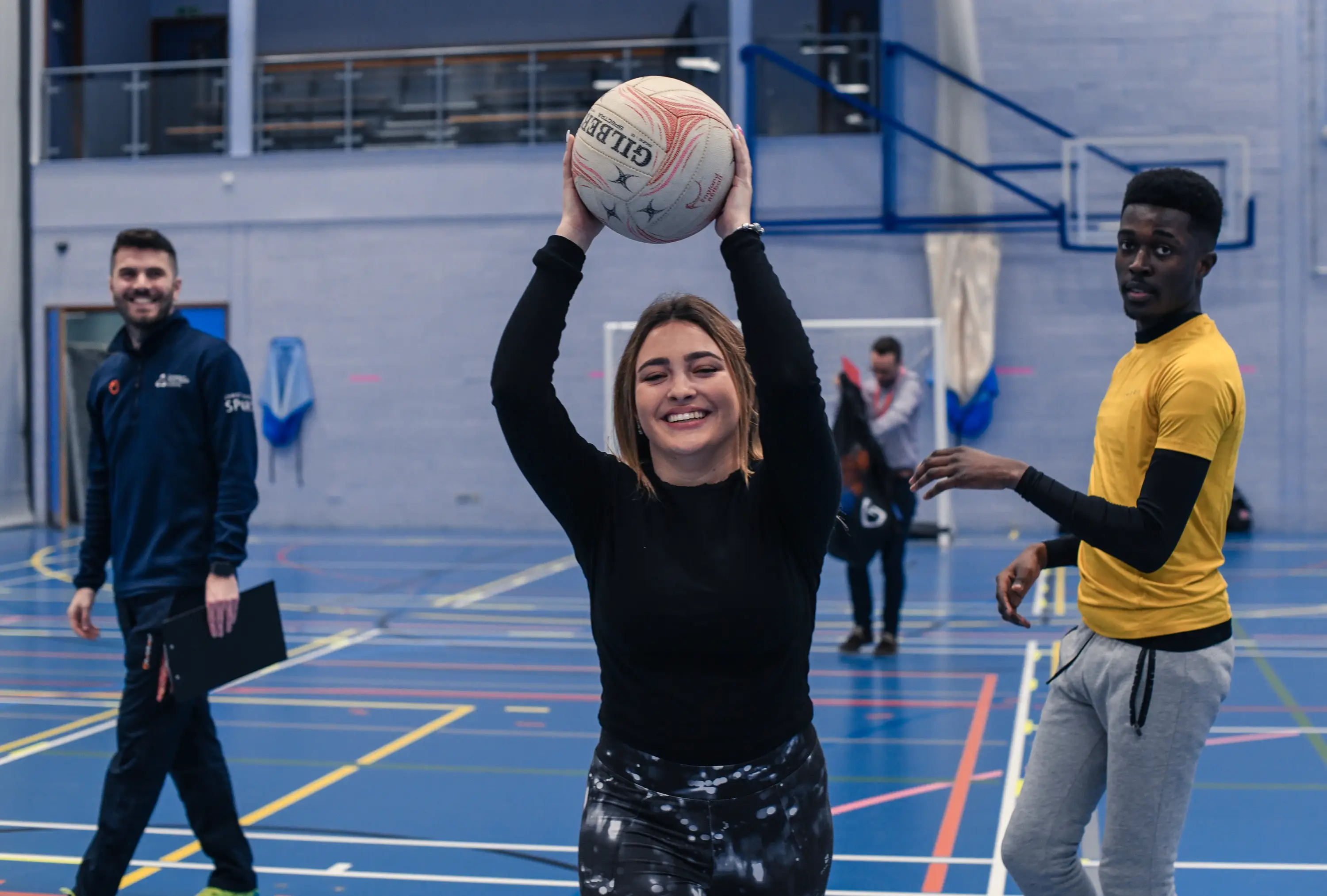 A women holding a ball