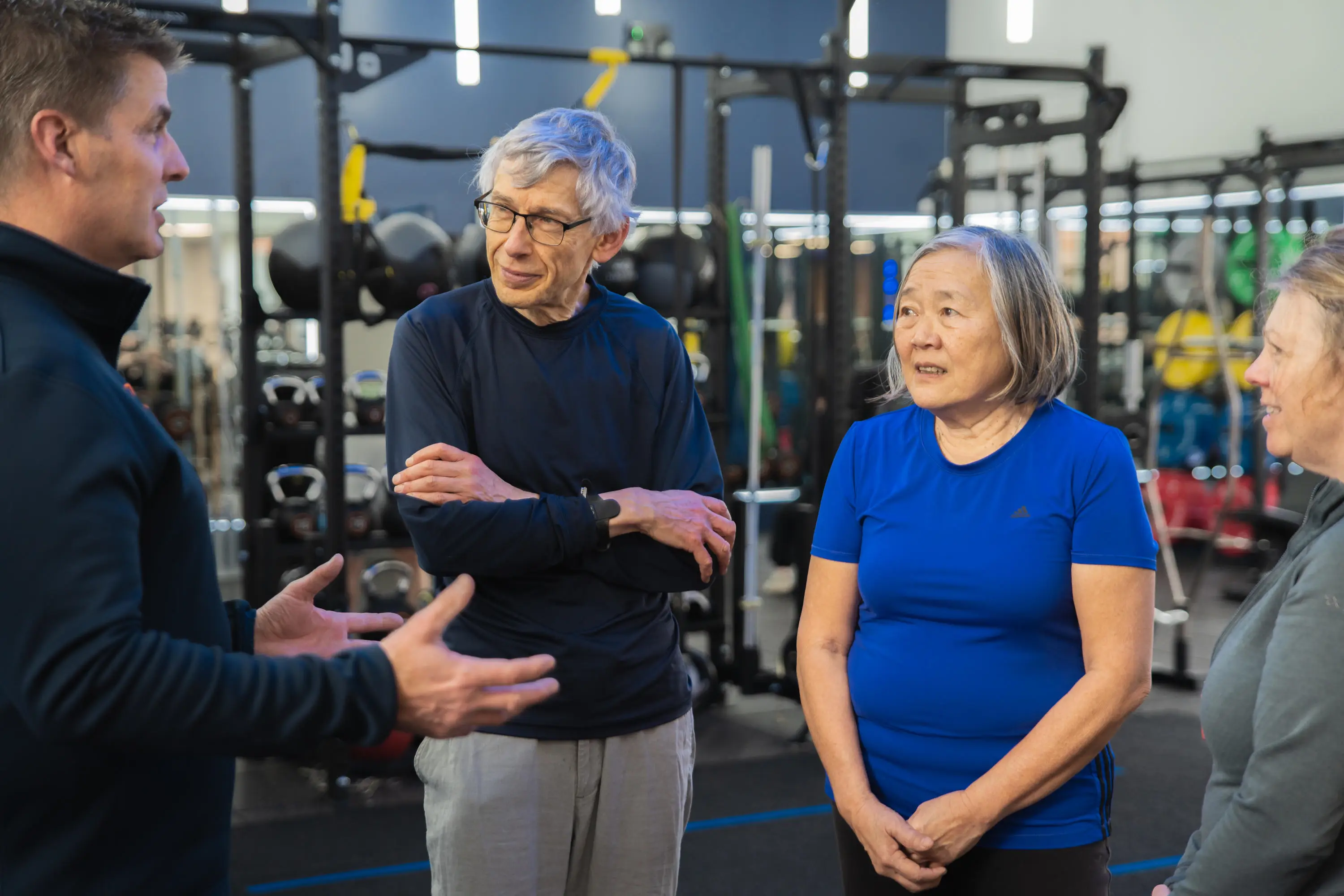 Instructor talking to a group of Fit for Life participants