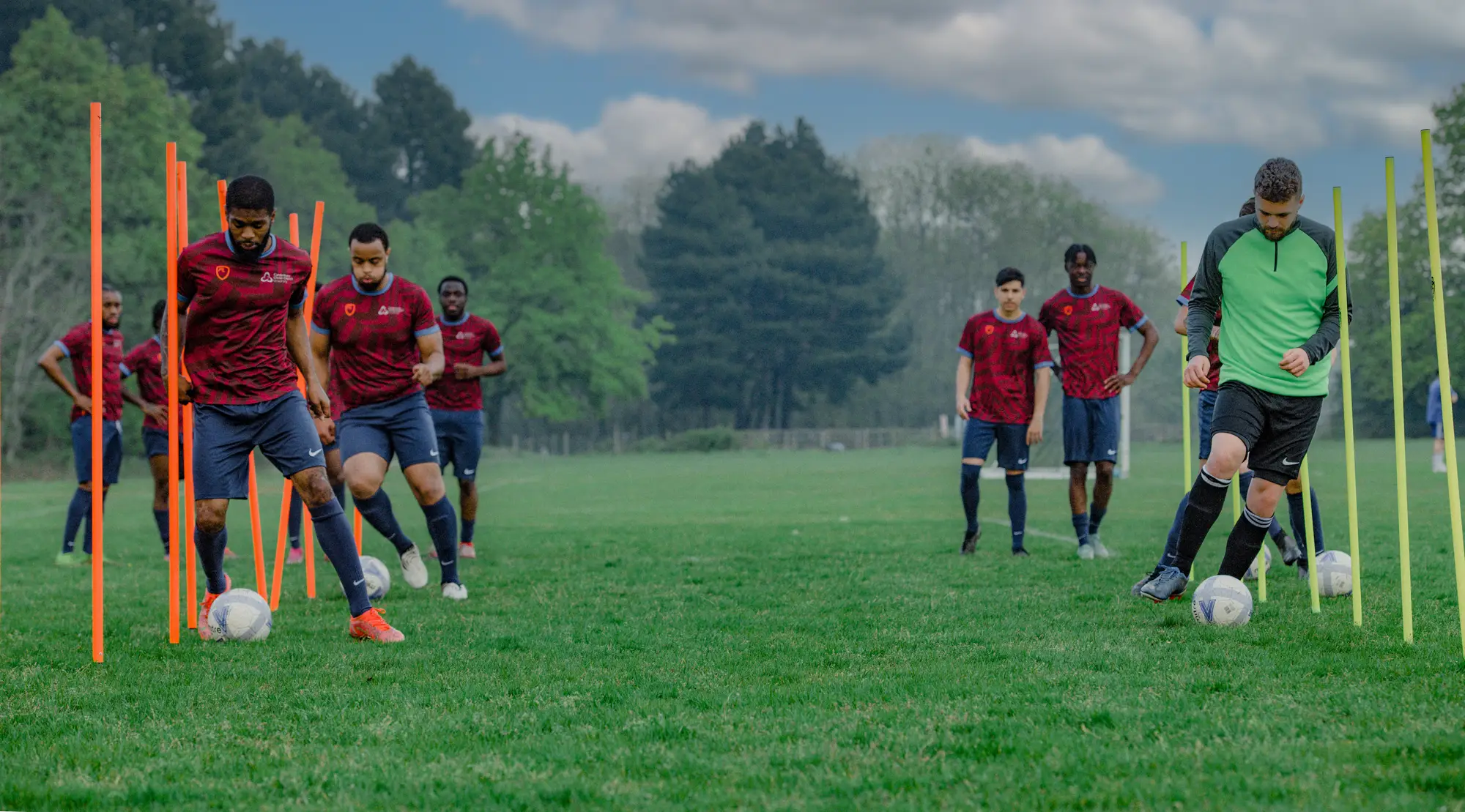 footballers dribbling on Stodmarsh pitches