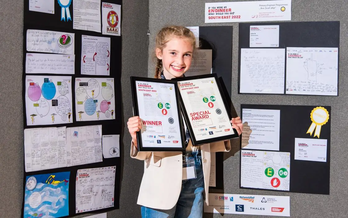 Anna with her two winning certificates and Emergency Stop design