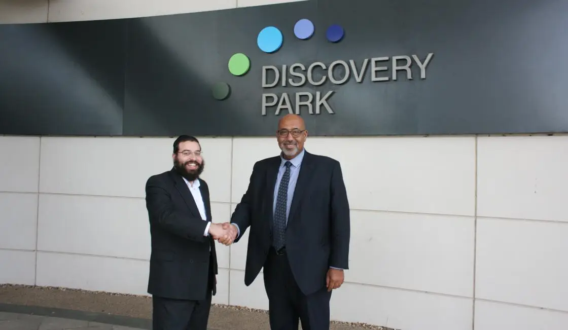 Discovery Park CEO, Mayer Schreiber, and Professor Mohamed Abdel-Maguid, Pro Vice-Chancellor (STEM) for Canterbury Christ Church University shaking hands outside Discovery Aprk
