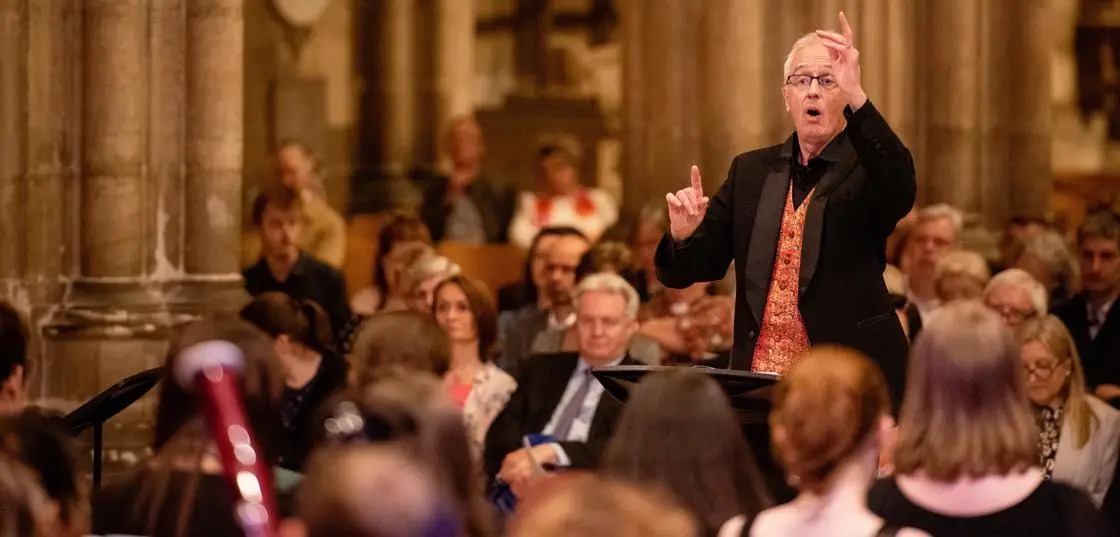Dr Christopher Price conducting in Canterbury Cathedral