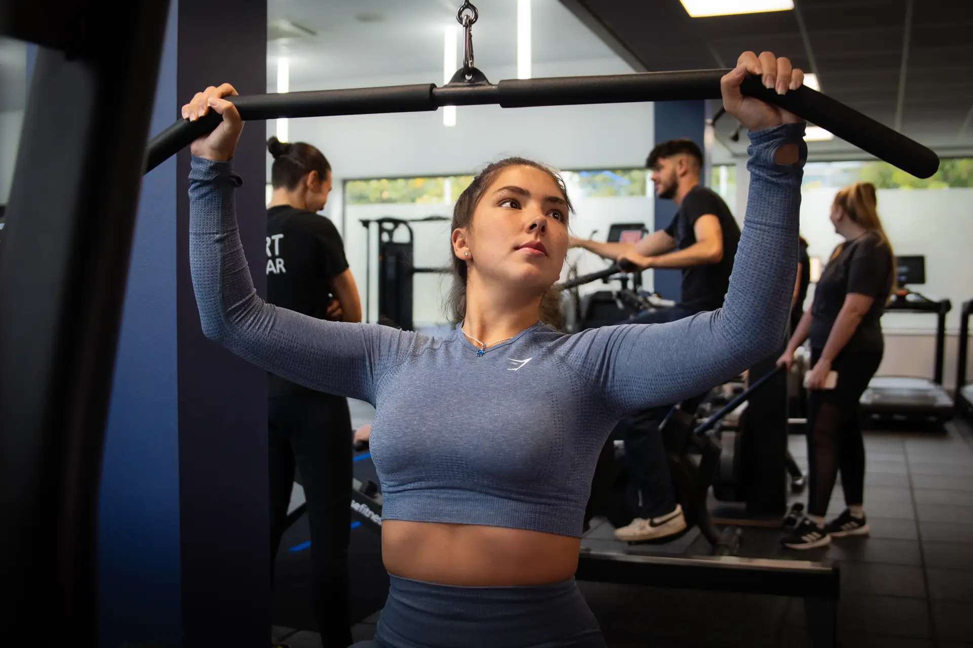 Student using Lat Pulldown