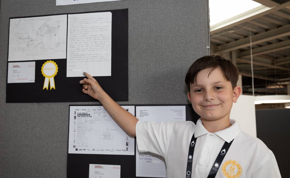 Preston, Year 5, with his winning design for a robotic auto snow shovel.